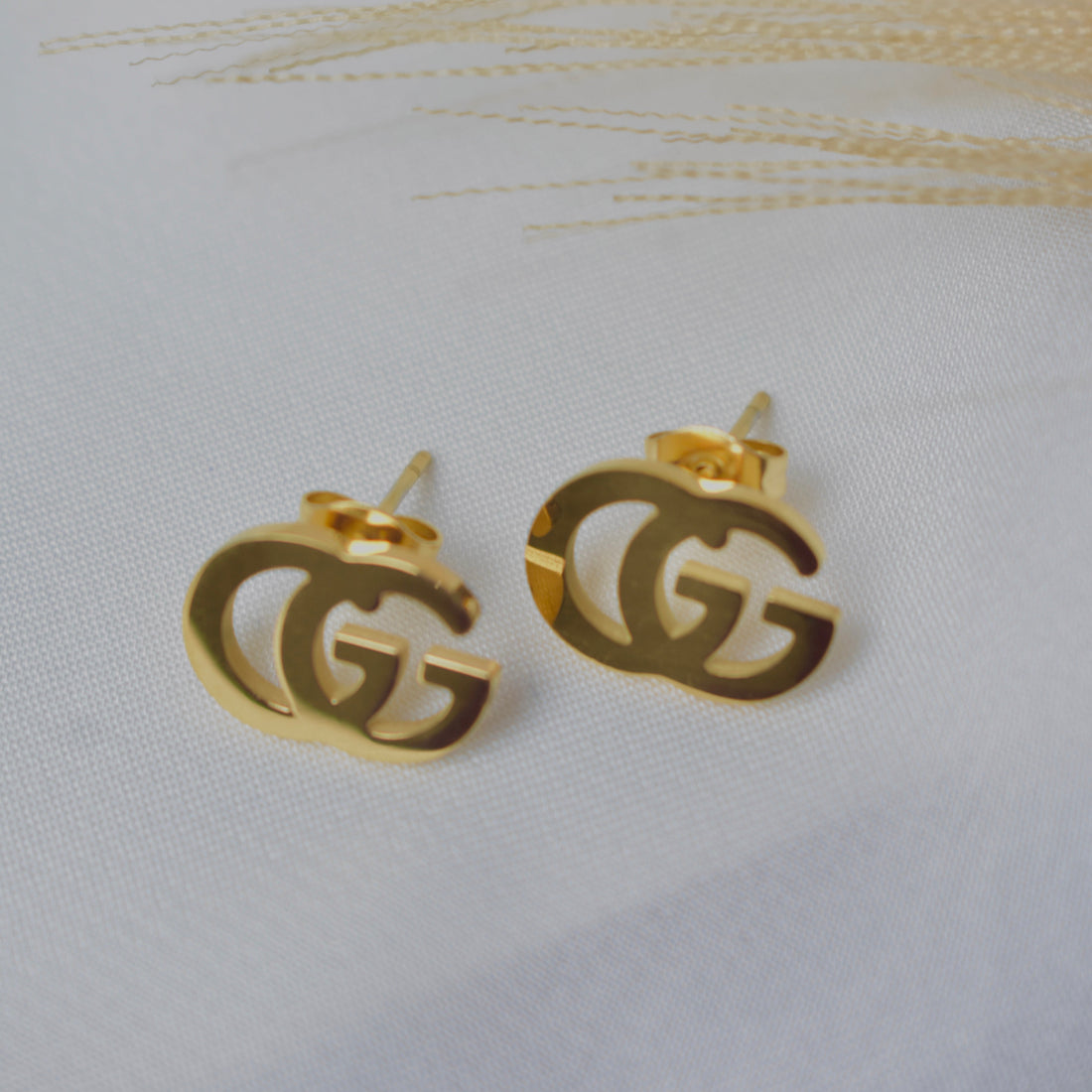Double G Logo Stud Earrings – Luxury Gold Designer Jewellery